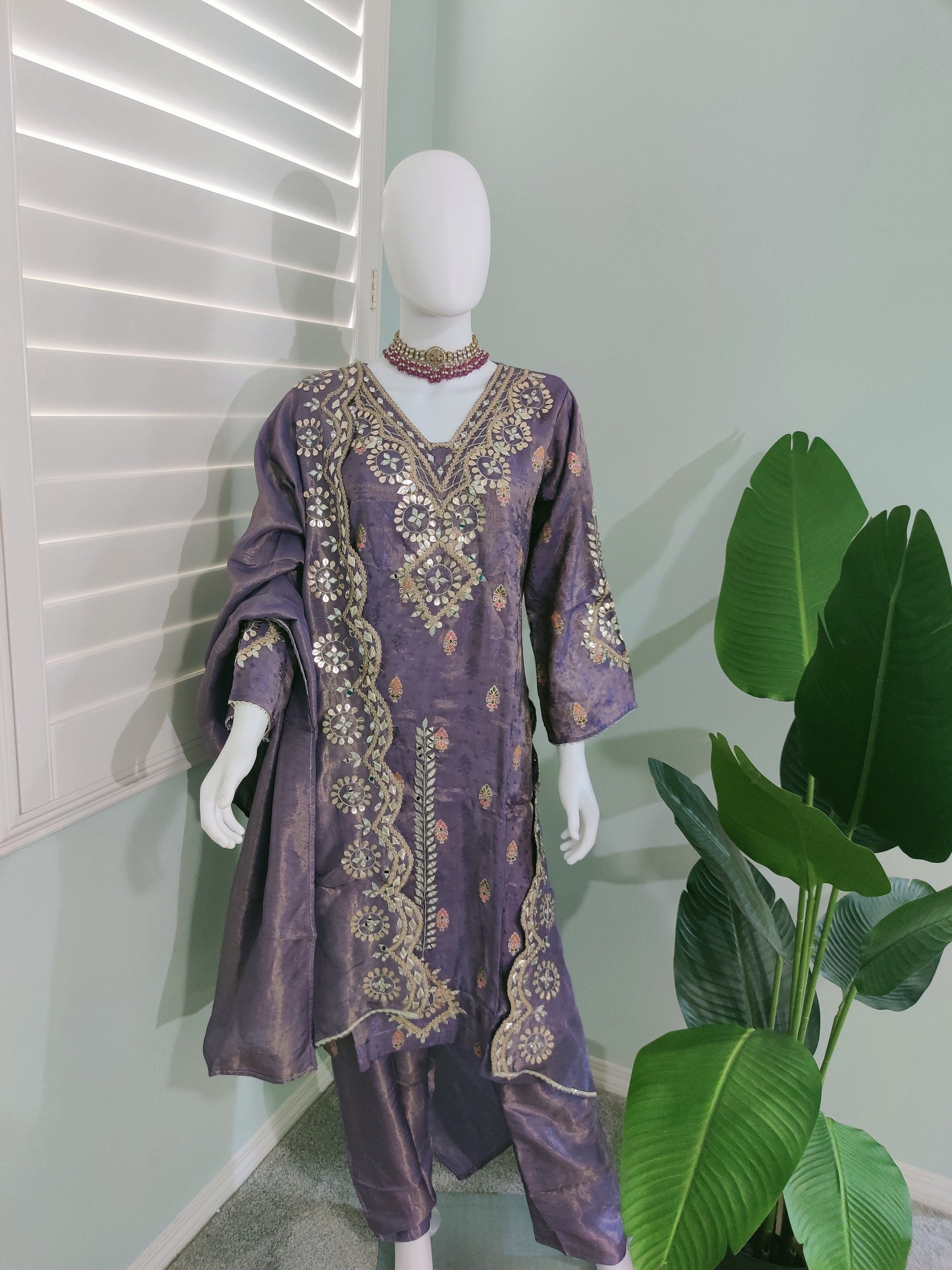 Regal Lavender straight kurta set with intricate gold-silver embroidery — celebration ready.