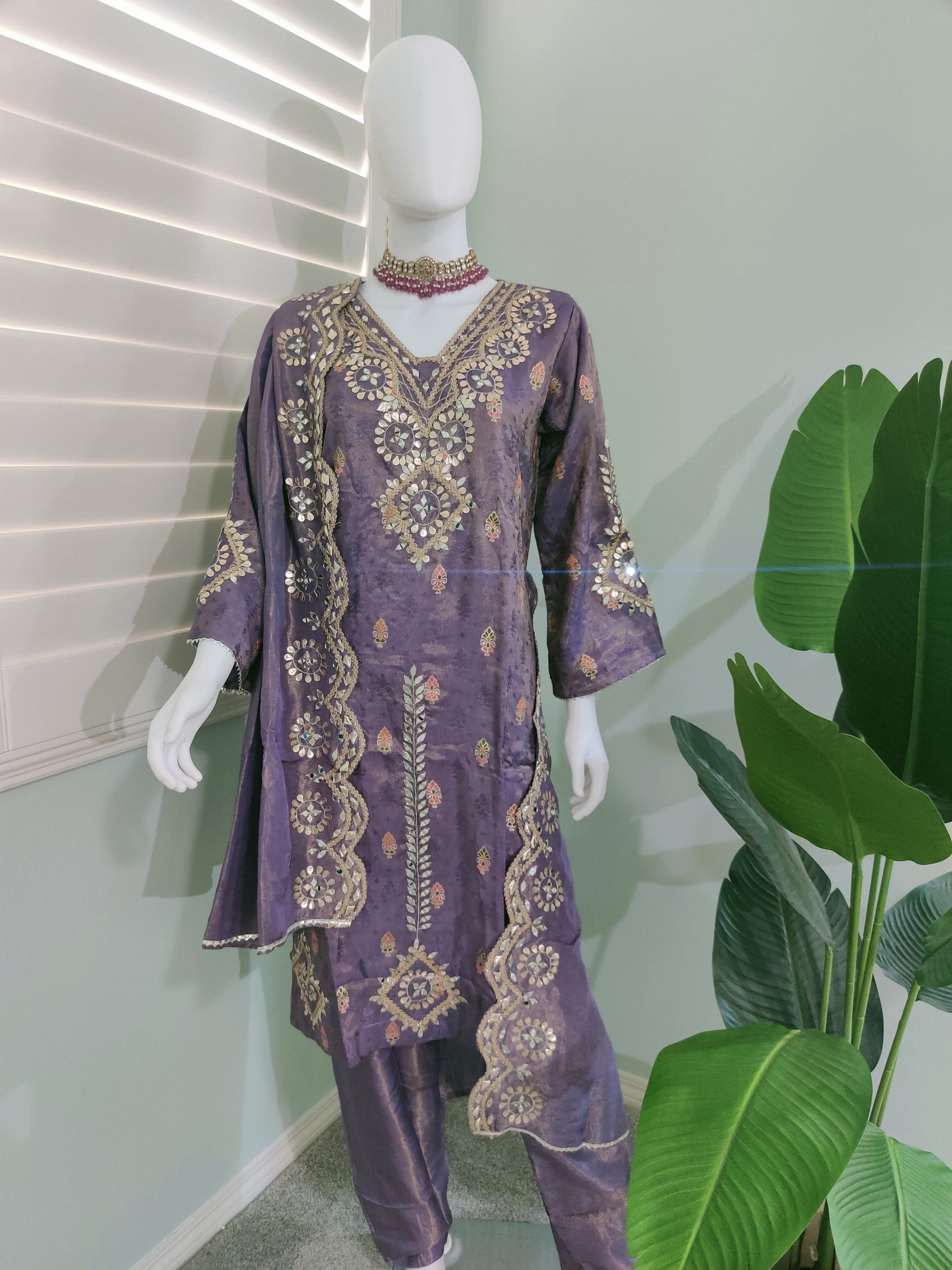 Regal Lavender straight kurta set with intricate gold-silver embroidery — celebration ready.